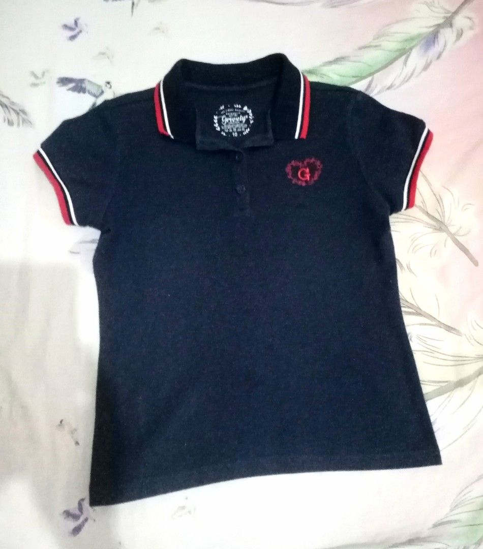 Grizzly Polo Shirt - Size 10 (Category: Babies & Kids Fashion) located in Antipolo. Submitted by cone0812 (Listing ID 1410554265, Image 1). Description: - Grizzly polo shirt - Color: Dark blue - Size: 10 Length - 19 inches Shoulder-12 inches Armpit to armpit - 13 inches.