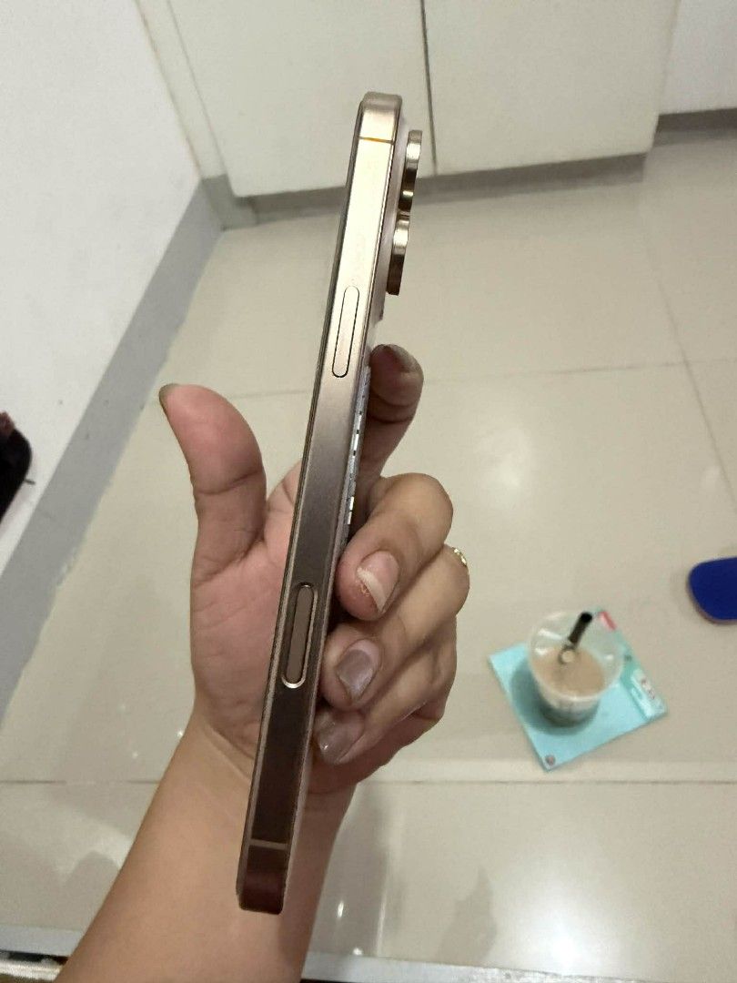 iPhone 16 Pro Max Desert Titanium - 256 GB WITH BOX (Category: iPhone 16 Series) located in Quezon City. Submitted by stuff.decluttered (Listing ID 1410687232, Image 3). Description: NEGOTIABLE USED BUT LIKE NEW Bought in June 2025 for 91,990 pesos - Still under warranty ('til JUNE 2026) - 100% Battery Capacity - No major flaws - With box - With OG charger.