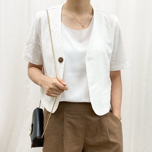 Ivory White Short Sleeve Blazer (Category: Coats, Jackets and Outerwear) located in Cavite. Submitted by cssndrakateg (Listing ID 1410680667, Image 2). Description: - Secon de Secon Ivory Blazer - Cropped length - V-neck design - Two-button closure - Two front pockets - Made of 100% cotton - Perfect for layering - Available colors: Ivory.