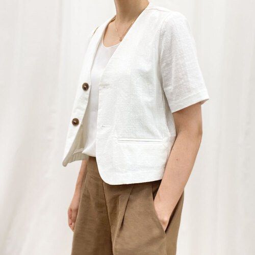 Ivory White Short Sleeve Blazer (Category: Coats, Jackets and Outerwear) located in Cavite. Submitted by cssndrakateg (Listing ID 1410680667, Image 1). Description: - Secon de Secon Ivory Blazer - Cropped length - V-neck design - Two-button closure - Two front pockets - Made of 100% cotton - Perfect for layering - Available colors: Ivory.