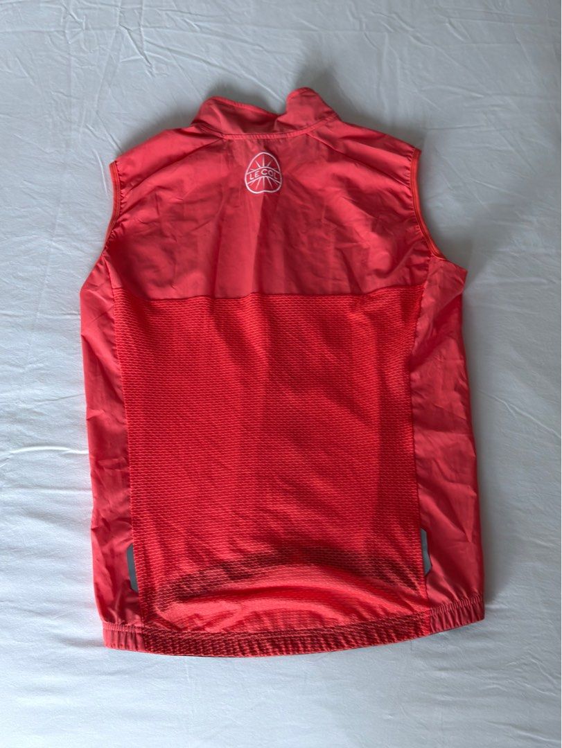 Le Col Cycling Vest - Coral (Category: Activewear) located in Makati City. Submitted by marcolimjap (Listing ID 1410599192, Image 2). Description: Never used. Just stored in closet.