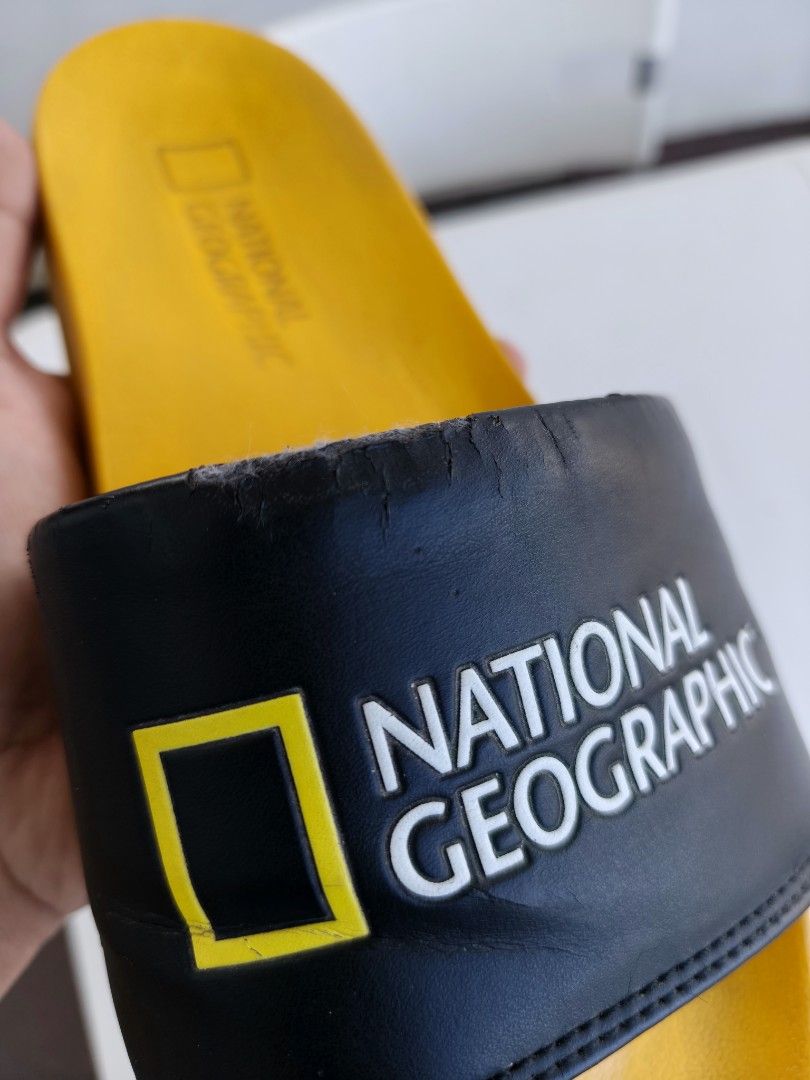 National Geographic Slides (Category: Slippers & Slides) located in Bulacan. Submitted by starterpackoo (Listing ID 1410597932, Image 3). Description: - National Geographic Slides - Yellow footbed - Black strap with logo - Comfortable design - Perfect for casual, everyday wear.