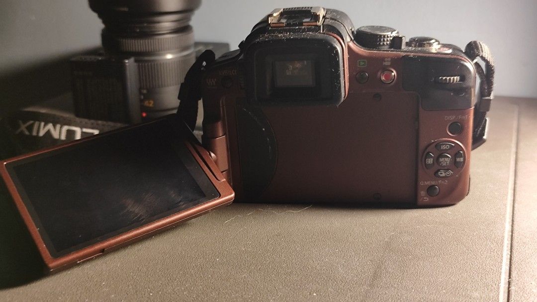 Panasonic Lumix DMC-G3K KIT (Category: Cameras) located in Caloocan City. Submitted by kyleeealien (Listing ID 1410626611, Image 2). Description: Included - Panasonic Lumix DMC‑G3K body - Lumix 14‑42 mm kit lens - Lens cap (Lumix) - Lens hood - Original battery - Original charger - Strap (as seen in images) - Box Condition 7.5/10 - Everything works except the rear dial, which is not functional. - Camera powers on and takes photos normally. - Rear