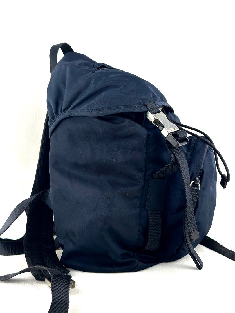 PRADA Re-Nylon Backpack (Category: Luxury Bags & Wallets) located in Manila. Submitted by luvluxe.mnl (Listing ID 1410656894, Image 3). Description: Small size but can fit a lot- fits laptop Comes with authenticity card Excellent to like new condition Unisex.