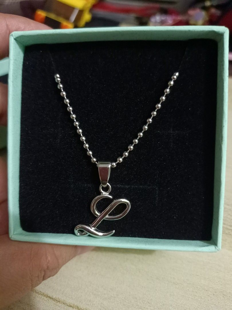 Silverworks necklace with L pendant (Category: Necklaces) located in Quezon City. Submitted by nikainess (Listing ID 1410609230, Image 2). Description: Should be the exchange gift of my daughter but delivered late. Will sell at a lower price. Original price is at 315..