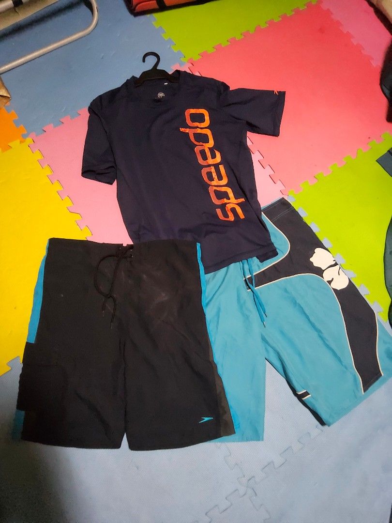 2 Swim Trunks Bundle | Size L–XL | (Category: Swim Trunks & Board Shorts) located in Pasig City. Submitted by qwerty1026 (Listing ID 1410579443, Image 1). Description: Get beach- or pool-ready with this 3-piece swimwear set in excellent pre-loved condition: ✅ Speedo Rash Guard- short sleeve (Size L) – Authentic, anti-UV protection, quick-dry (SOLD) ✅ Speedo Swim Trunks (Size XL) – Classic black/blue with logo ✅ Q Club London Swim Trunks (Size XL)