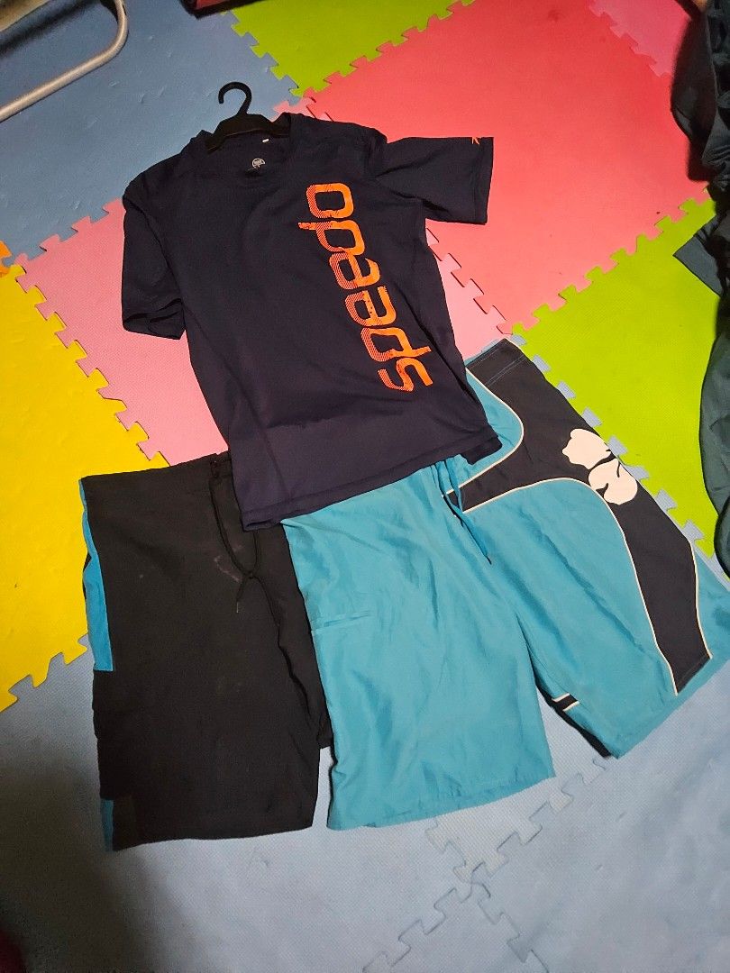 2 Swim Trunks Bundle | Size L–XL | (Category: Swim Trunks & Board Shorts) located in Pasig City. Submitted by qwerty1026 (Listing ID 1410579443, Image 2). Description: Get beach- or pool-ready with this 3-piece swimwear set in excellent pre-loved condition: ✅ Speedo Rash Guard- short sleeve (Size L) – Authentic, anti-UV protection, quick-dry (SOLD) ✅ Speedo Swim Trunks (Size XL) – Classic black/blue with logo ✅ Q Club London Swim Trunks (Size XL)