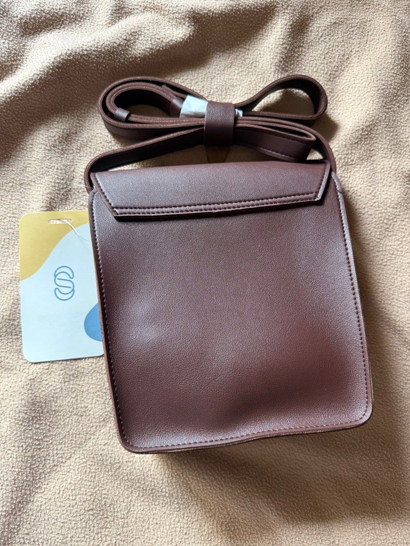 Straightforward Sling Bag (Category: Sling Bags) located in Paranaque City. Submitted by ohsofancy777 (Listing ID 1410564100, Image 3). Description: •Brand new with Tag •Authentic •Location is Paranaque.