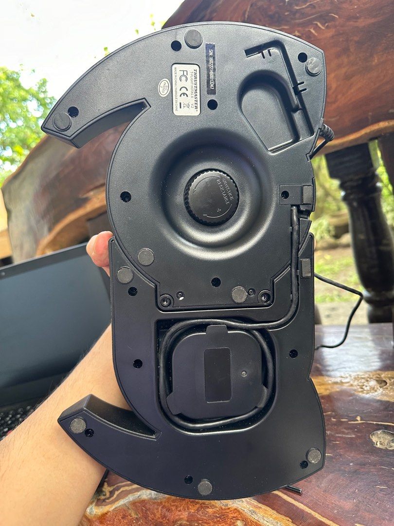 Thrustmaster t.flight Hotas X (Category: Controllers) located in Liliw. Submitted by luthersuerte (Listing ID 1410625111, Image 3). Description: - Thrustmaster T.Flight Hotas X joystick - Detachable throttle and joystick - Multiple buttons for control - POV hat switch - Rubber feet for stability - Cable storage compartment - Stylish black design with red accents.