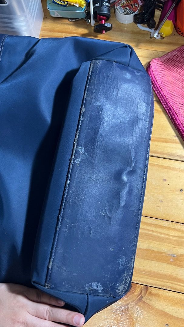Tommy Nylon Bag (Category: Tote Bags) located in Lipa City. Submitted by declutterstuff123 (Listing ID 1410712330, Image 3). Description: Nylon is still in very good condition. Barely Used Parts with synthetic leather has cracked since nakatambak ng matagal sa cabinet. ⭕️Everything Must Go! ⭕️Grouped items are for TAKE ALL. No individual selling. ⭕️All items sold as is basis. Manage expectations based on pictures. No return, no exchange. ⭕️SF wil