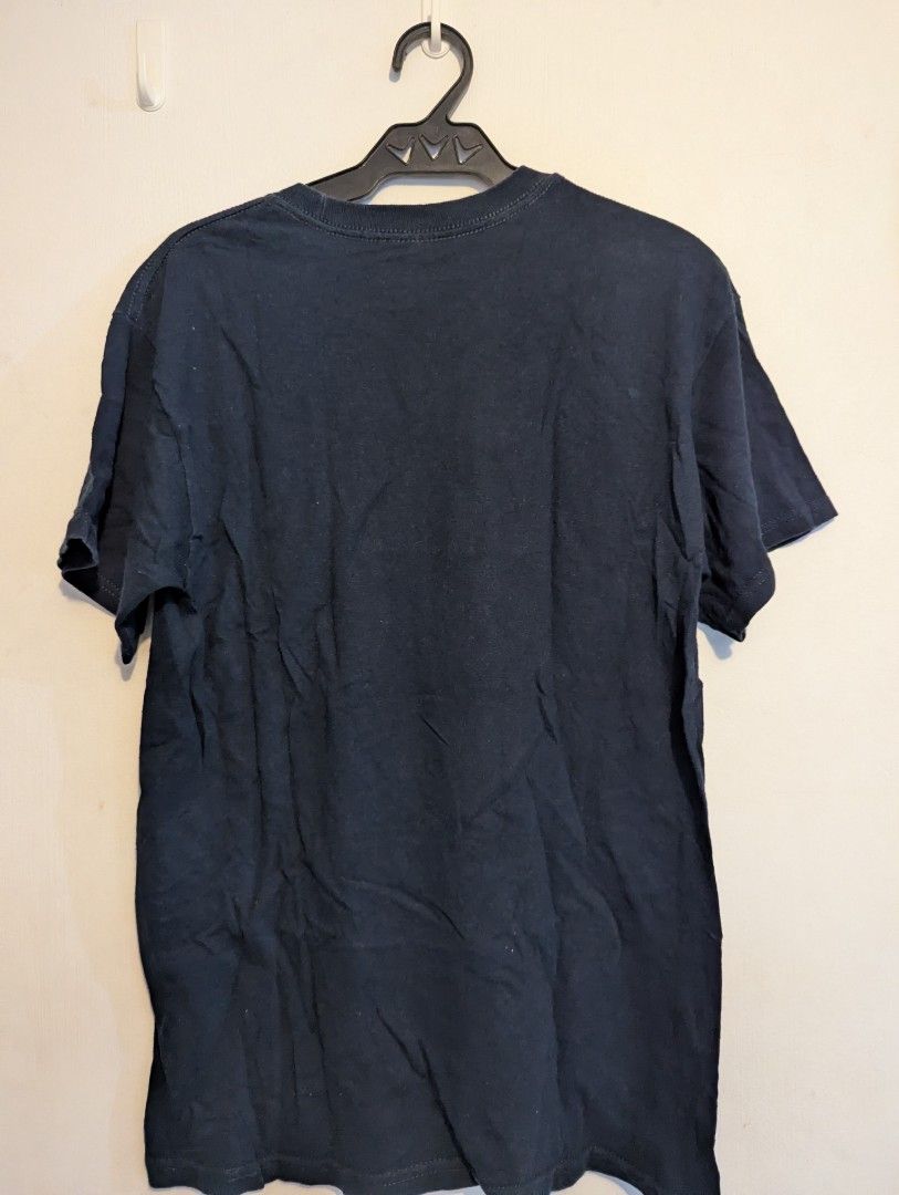 Toronto True North T-shirt (Category: Tshirts & Polo Shirts ) located in Porac. Submitted by themightythrift (Listing ID 1410630760, Image 2). Description: - Dark blue Toronto True North T-shirt - Features Toronto logo with maple leaf emblem and 1834 - Short sleeves - Crew neck - Soft fabric - Plain back.