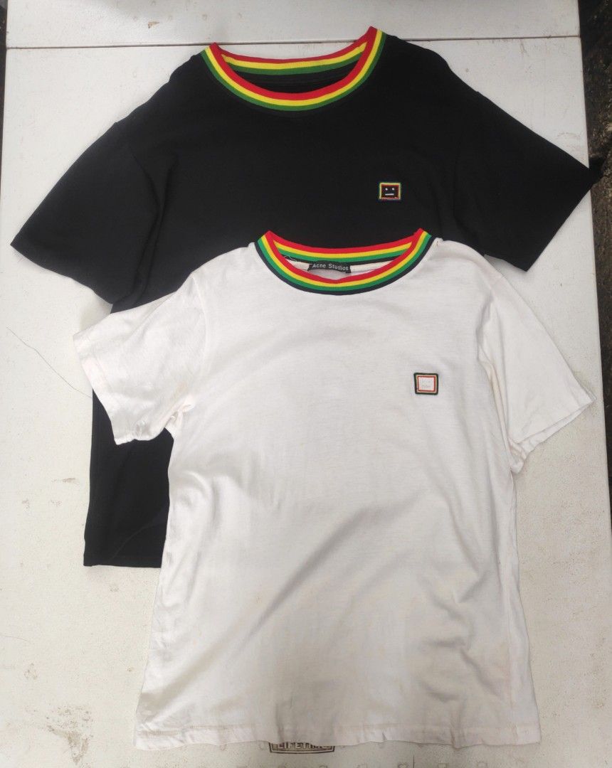 Acne Studios T-shirt with Striped Collar (Category: Luxury Apparel) located in San Jose. Submitted by sugapaman (Listing ID 1407440715, Image 1). Description: - Two Acne Studios T-shirts included. - Colors: Black and White. - Features a striped collar with red, yellow, and green colors. - Small square logo on the chest. - Made of comfortable fabric. aspack .