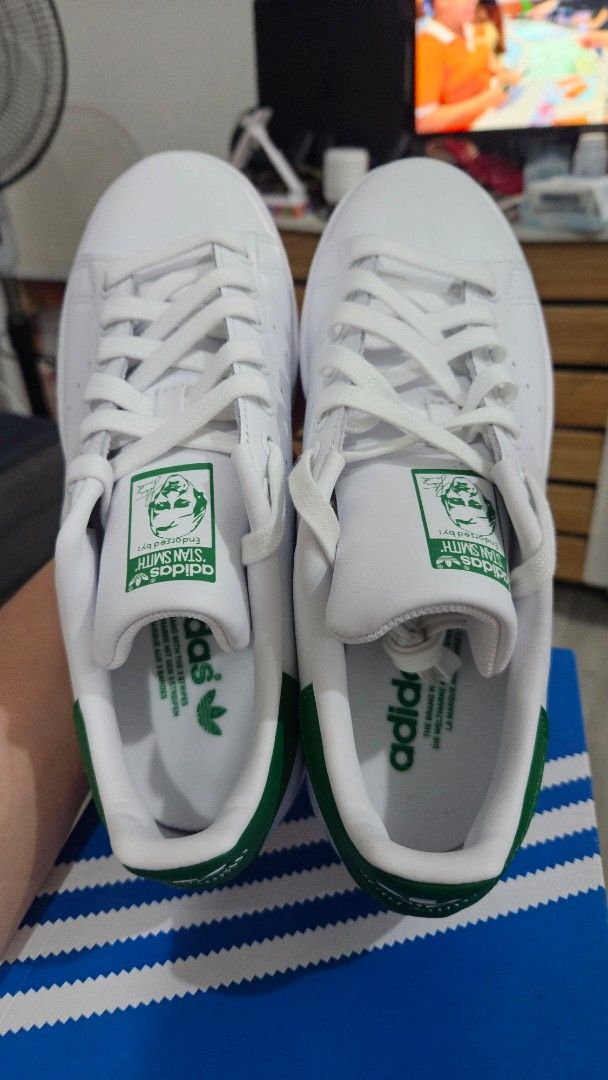 Adidas Stan Smith White Green Sneakers (Category: Sneakers) located in Pasig City. Submitted by vinavillamar (Listing ID 1407462574, Image 3). Description: Adidas Stan Smith sneakers in white with green accents. - Includes the original box. - The size is 6.5 US .