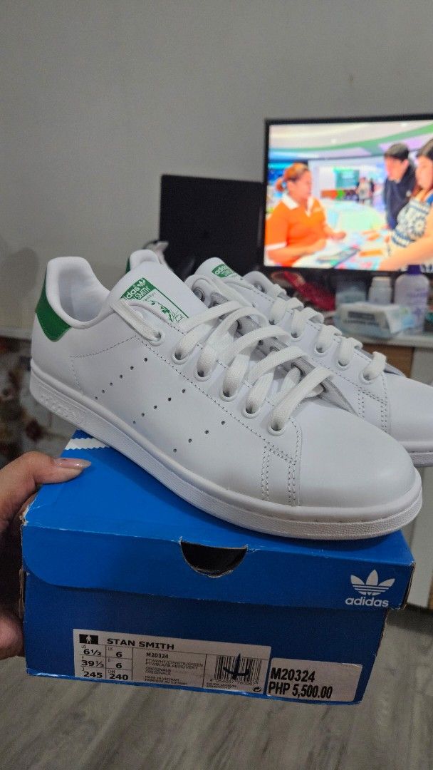 Adidas Stan Smith White Green Sneakers (Category: Sneakers) located in Pasig City. Submitted by vinavillamar (Listing ID 1407462574, Image 2). Description: Adidas Stan Smith sneakers in white with green accents. - Includes the original box. - The size is 6.5 US .
