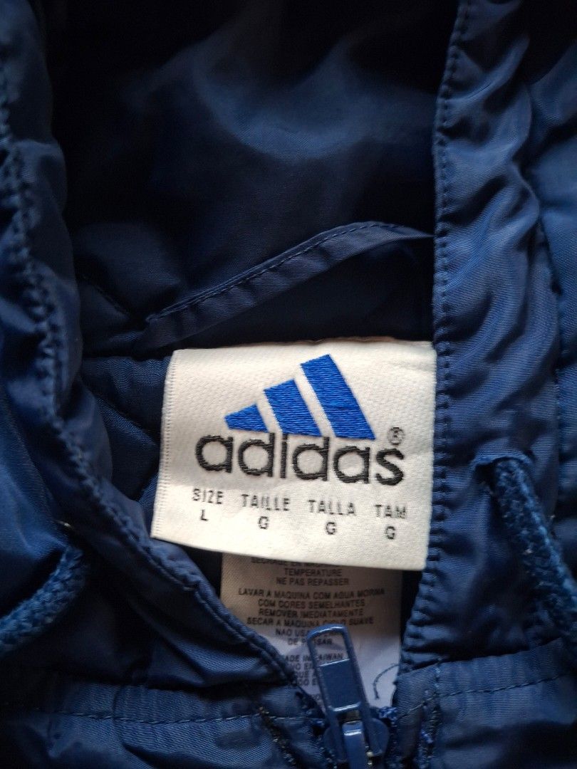 adidas vintage windbreaker (Category: Coats, Jackets and Outerwear) located in Manila. Submitted by nervccc (Listing ID 1407432879, Image 2). Description: no issues 23/29 fits to L to XL.