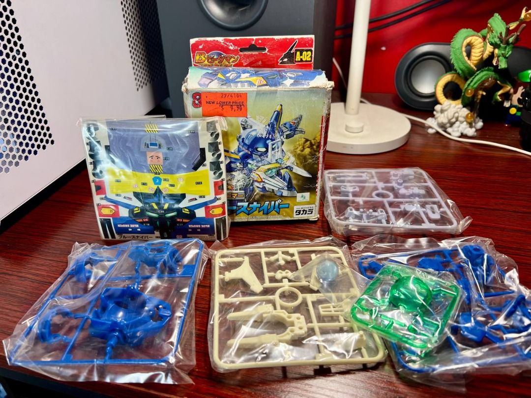B-DAMAN Takara Blue Sniper Model Kit (Category: Action & Battle Toys) located in Baguio. Submitted by ditoyzb08176 (Listing ID 1407409695, Image 3). Description: - Vintage Takara Blue Sniper model kit. - Box art shows the assembled model. - Includes multiple sealed plastic bags with kit parts. - Box condition: Shows wear and tear. - Vintage item, likely from the 1990s. Location: Baguio City Shipping: J&T/FLASH/LBC.
