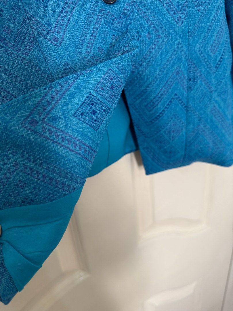 Blue Patterned Blazer - Medium (Category: Coats, Jackets and Outerwear) located in Cavite. Submitted by cielinesid (Listing ID 1407493145, Image 2). Description: - Stylish blue blazer - Unique patterned design - Single-button closure - Vibrant blue lining - Size: Medium (38" bust, 32" waist).