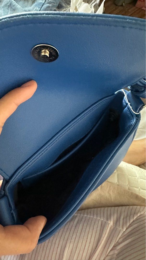 Blue Shoulder Bag with Adjustable Strap (Category: Shoulder Bags) located in Marikina City. Submitted by hell0ysh (Listing ID 1407565103, Image 3). Description: - brand new, still with tag - bought from Bangkok - Blue shoulder bag - Flap closure - Adjustable strap - Magnetic snap closure - Small interior pocket - Smooth material - Ideal for daily wear Location: marikina/lower antipolo.
