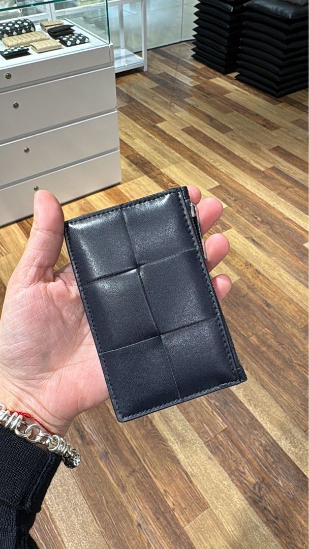 Bottega Veneta Card Holder (Category: Luxury Bags & Wallets) located in Taguig. Submitted by sourcedbym (Listing ID 1407514283, Image 1). Description: - Bottega Veneta card holder - Black color - Zippered compartment - Card slots at the back - Features the Bottega Veneta logo Great gift for Christmas! #bottega #bottegaveneta.