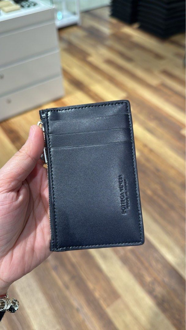 Bottega Veneta Card Holder (Category: Luxury Bags & Wallets) located in Taguig. Submitted by sourcedbym (Listing ID 1407514283, Image 2). Description: - Bottega Veneta card holder - Black color - Zippered compartment - Card slots at the back - Features the Bottega Veneta logo Great gift for Christmas! #bottega #bottegaveneta.