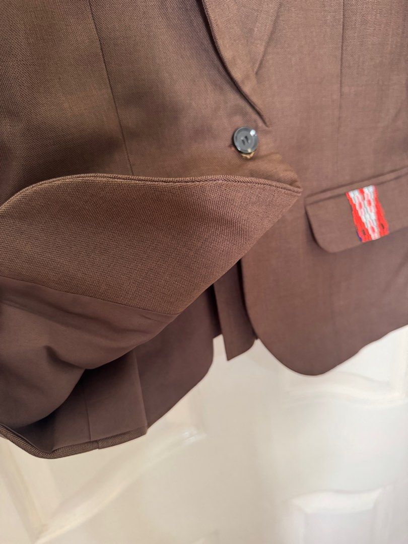 Brown Blazer with Ethnic Details - Medium (Category: Coats, Jackets and Outerwear) located in Cavite. Submitted by cielinesid (Listing ID 1407492201, Image 3). Description: - Stylish brown blazer - Ethnic design accents - Single-button closure - Tailored fit - Size: Medium (38" bust, 32" waist) .