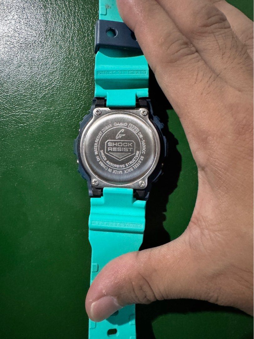 Casio G-Shock DW-5600CC-2 (Category: Men's Watches) located in Umingan. Submitted by kennedysonaco171 (Listing ID 1400632620, Image 2). Description: - Authentic Casio G-Shock digital watch - Digital display with time, date, and other functions - Comes with original box - Water resistant to 20BAR - Battery needs to be replaced..