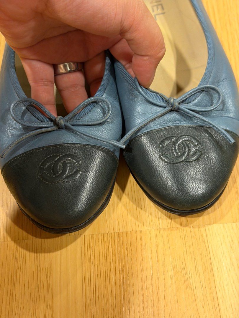 ON SALE: Chanel Cap Toe Flats (Category: Sneakers & Footwear) located in Quezon City. Submitted by bluebherie (Listing ID 1407502379, Image 2). Description: - Authentic Chanel flats - Size: 38 1/2 C - Blue leather upper with black cap toe and bow - Made in Italy - Signs of wear on soles - Chanel logo on insole and sole - Serial number: G02819 - No return, no exchange.