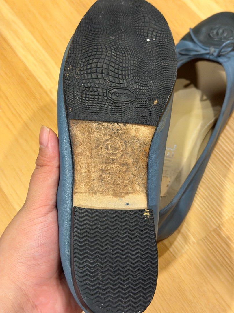ON SALE: Chanel Cap Toe Flats (Category: Sneakers & Footwear) located in Quezon City. Submitted by bluebherie (Listing ID 1407502379, Image 3). Description: - Authentic Chanel flats - Size: 38 1/2 C - Blue leather upper with black cap toe and bow - Made in Italy - Signs of wear on soles - Chanel logo on insole and sole - Serial number: G02819 - No return, no exchange.
