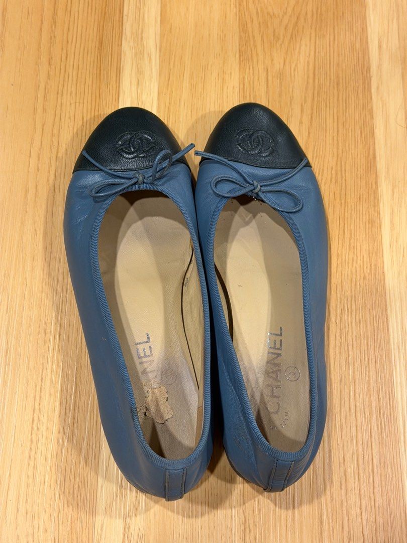 ON SALE: Chanel Cap Toe Flats (Category: Sneakers & Footwear) located in Quezon City. Submitted by bluebherie (Listing ID 1407502379, Image 1). Description: - Authentic Chanel flats - Size: 38 1/2 C - Blue leather upper with black cap toe and bow - Made in Italy - Signs of wear on soles - Chanel logo on insole and sole - Serial number: G02819 - No return, no exchange.
