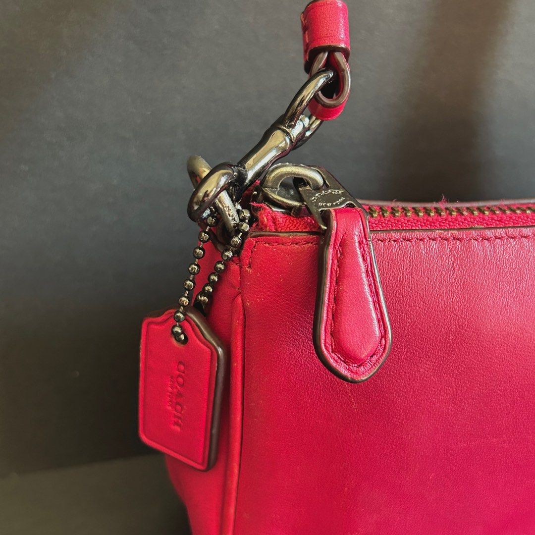 Coach Pink Wristlet Bag (Category: Luxury Bags & Wallets) located in Cabiao. Submitted by hoardercanthelpit (Listing ID 1407556272, Image 3). Description: .