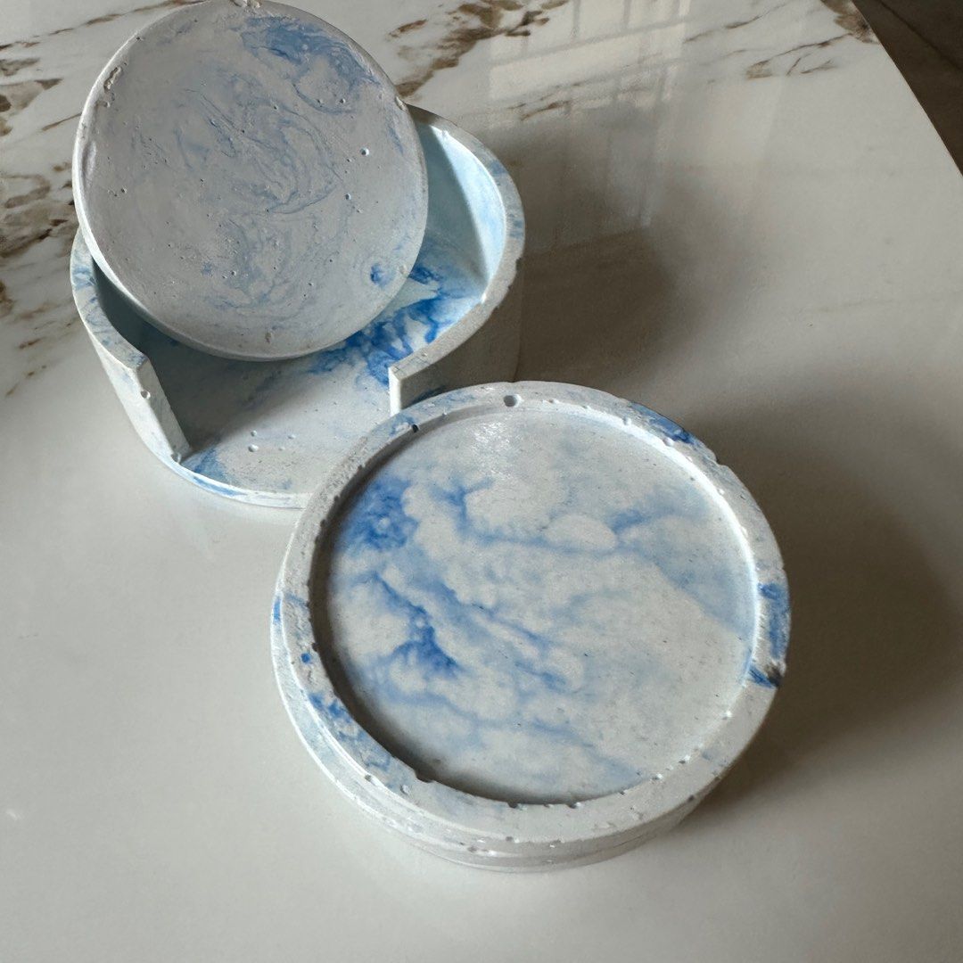 Custom White-Blue Marble Coaster Set (Category: Coffee & Tea Tableware) located in Manila. Submitted by hunchbunch (Listing ID 1407444995, Image 1). Description: - bought for 410 - now selling for 180 - sealed (water-repellent) - size: 8cm diameter x 1cm height - barely used - this is handmade, which means there are some imperfections such as cracks, discoloration, and uneven sanding but it won’t affect functionality - rfs: decluttering.