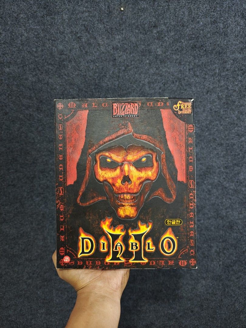 SALE ❗Diablo II PC Game (Category: Others) located in Alaminos. Submitted by epargne (Listing ID 1407487859, Image 1). Description: Diablo II Publisher: Blizzard Entertainment Genre: Action RPG Key Features: Immersive storyline, challenging quests, and a vast world to explore. Content: This edition typically includes the original game manual and installation guide. Language: The box includes text indicating it is a Korean language version (한글판)..