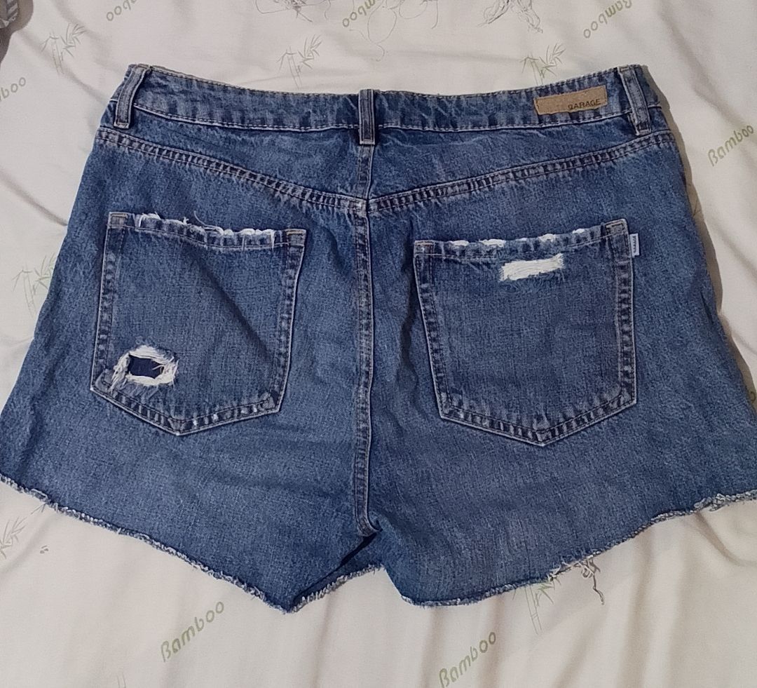 Garage Denim Shorts - Size 11 (Category: Shorts) located in Pasig City. Submitted by lizasxnw (Listing ID 1407431222, Image 2). Description: - Garage distressed denim shorts - Size 11 - Classic five-pocket design - Button and zipper closure - Raw hem - Ripped details on front and back - Ideal for casual wear.