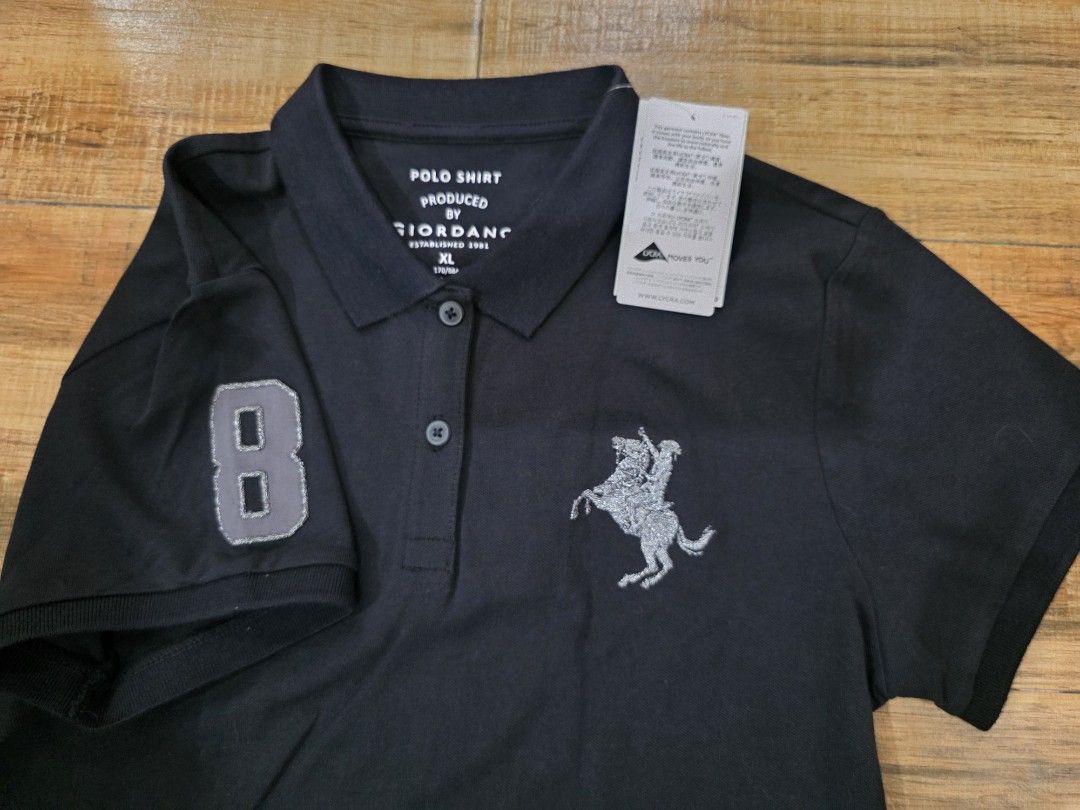 Giordano Polo Shirt XL (Category: Blouses) located in Quezon City. Submitted by bagsplusmore (Listing ID 1407529186, Image 2). Description: - Giordano black polo shirt - Size: XL - New with tags - Features horse logo on chest - Number "8" on left sleeve - Three-button placket - Collar.