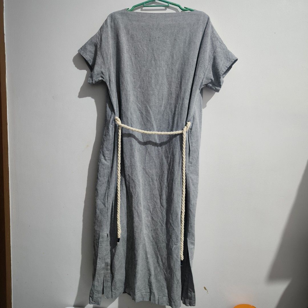 Gray Dress with Belt Size M (Category: Dresses) located in Makati City. Submitted by mampuan (Listing ID 1407557584, Image 2). Description: - Gray dress - Size: M - Features: Short sleeves, boat neck, rope belt - Fabric: 55% cotton, 45% linen, 80% polyester, 20% cotton - Design: Simple, relaxed fit - With belt - Runs big - Noted stains at the neckline, see last pic .