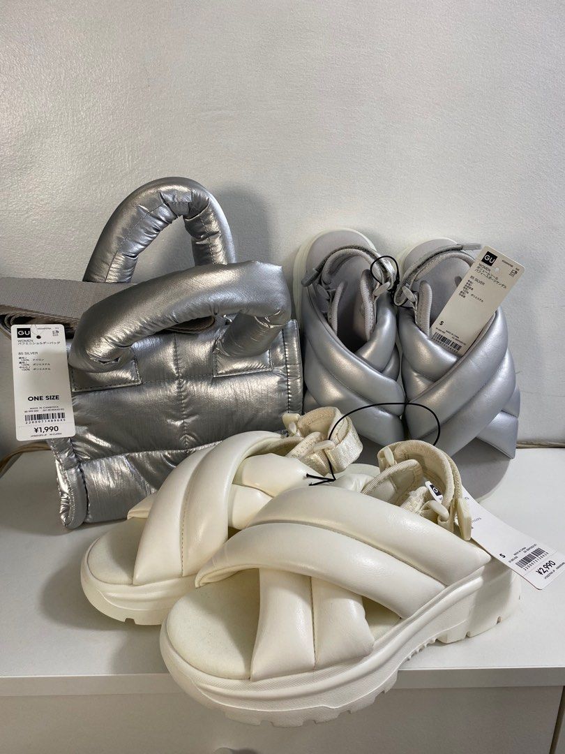 GU Puffed Shoulder Bag and Sandals set (Category: Shoulder Bags) located in Makati City. Submitted by rainbowartist (Listing ID 1407453556, Image 1). Description: Selling as set All brand new 1 GU puff bag in silver 1 GU puff sandals in silver 1 GU puff sandals in white/cream Last price Shipping shouldered by buyer RFS: Extras + declutter MOP: Gcash MOD: LBC/Grab.