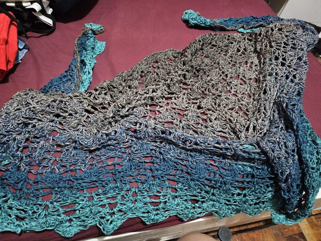 Handmade Crochet Shawl - Blue and Gray (Category: Scarves) located in Angeles City. Submitted by buxom.cheeks (Listing ID 1407442296, Image 1). Description: - Handmade crochet shawl - Blue and gray gradient color - Open, lacy design - Lightweight and comfortable - Adds elegance to any outfit - Unique, handcrafted piece.