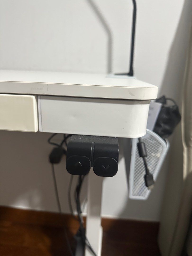 Height adjustable study/ work table (Category: Tables & Sets) located in Singapore. Submitted by liveearth-698f (Listing ID 1407496577, Image 2). Description: - Height adjustable table perfect for work/ studying - 80cm x 60cm - adjustable at the push of a button - price negotiable.