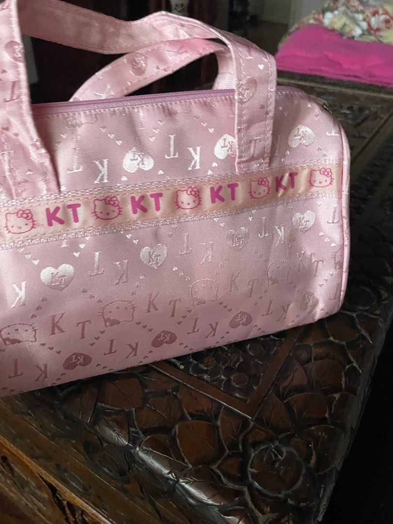 Hello Kitty Pink Handbag (Category: Shoulder Bags) located in Quezon City. Submitted by deadmit (Listing ID 1407563943, Image 3). Description: Just has a ballpen mark as shown in pic… No other issues… like new.