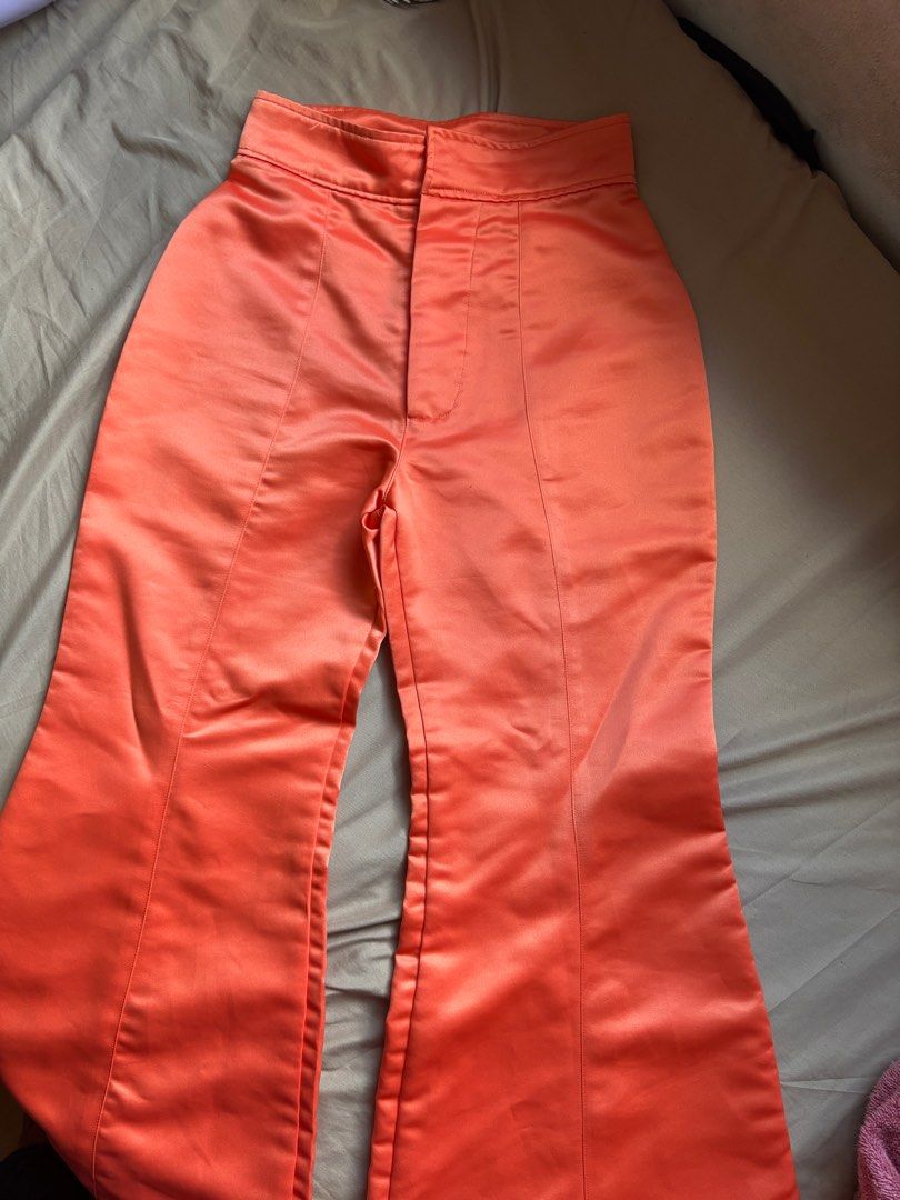 June 12 the Label Flare Pants - Orange (Category: Other Bottoms) located in Quezon City. Submitted by koalaaa_ (Listing ID 1407407952, Image 1). Description: Used this once for a Harry Styles concert. Does not fit me anymore June 12 the label orange flare pants. High-waisted, satin-like fabric. Classic flare cut with seam detail. Tag visible. .