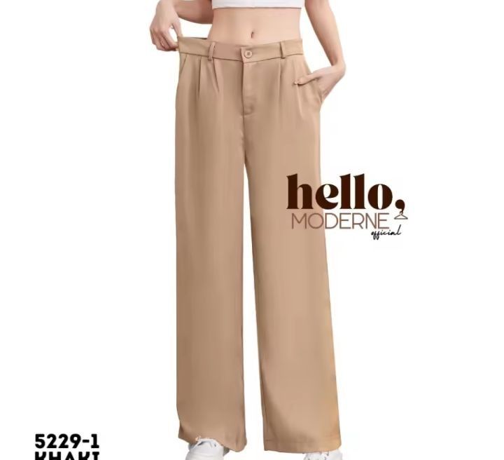 Khaki Wide Leg Trouser Pants - 30 (Category: Other Bottoms) located in Pasig City. Submitted by lizasxnw (Listing ID 1407432772, Image 1). Description: - Khaki wide-leg pants - Button closure - Front pleats - Relaxed fit - Lightweight fabric - Versatile style.