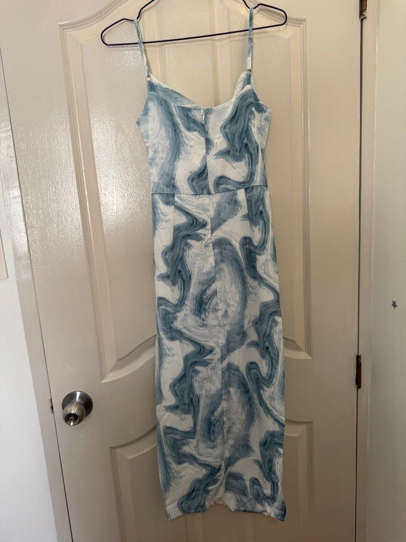Marble Print Midi Dress - Large (Category: Dresses) located in Cavite. Submitted by cielinesid (Listing ID 1407492113, Image 3). Description: - Marble print midi dress - Colors: Blue and white - Features: Cowl neckline, spaghetti straps - Size: Large - Bust: 32in - Waist: 27 inches - Length: 46in - Condition: Good - Perfect for special occasions.