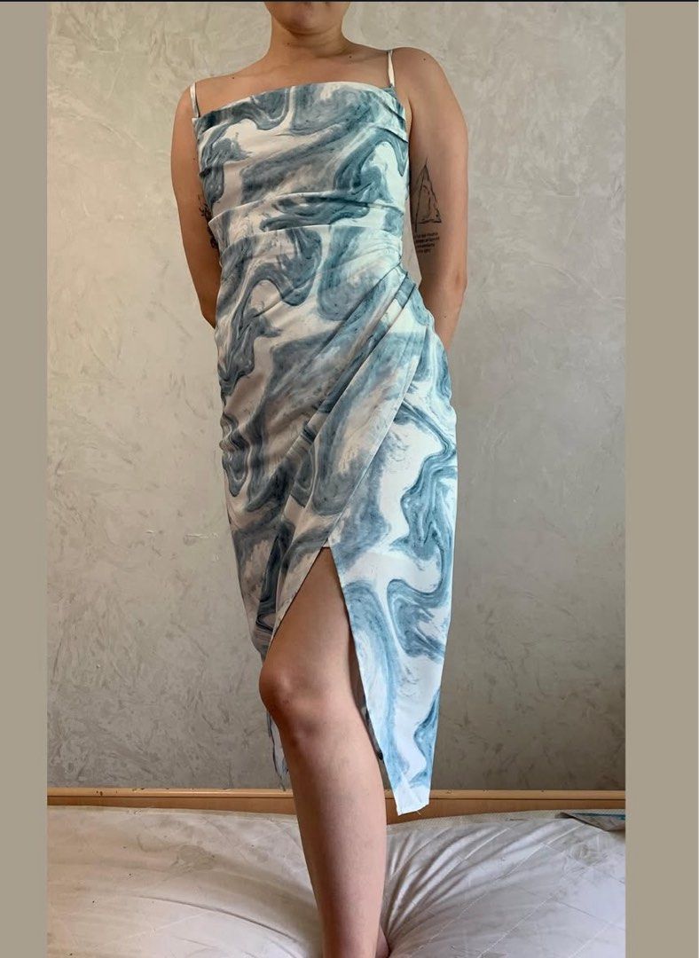 Marble Print Midi Dress - Large (Category: Dresses) located in Cavite. Submitted by cielinesid (Listing ID 1407492113, Image 1). Description: - Marble print midi dress - Colors: Blue and white - Features: Cowl neckline, spaghetti straps - Size: Large - Bust: 32in - Waist: 27 inches - Length: 46in - Condition: Good - Perfect for special occasions.