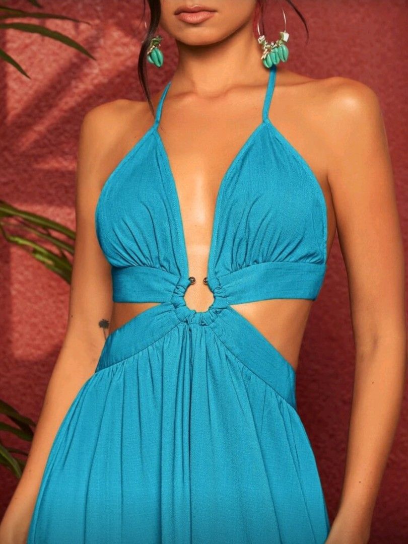 Mint Blue Halter Maxi Dress (Category: Dresses) located in Manila. Submitted by monaaa03 (Listing ID 1407558191, Image 3). Description: - Turquoise maxi dress - Halter neckline - Cutout design - Ring detail at waist - High slit - Tie-up back - Ideal for special occasions.