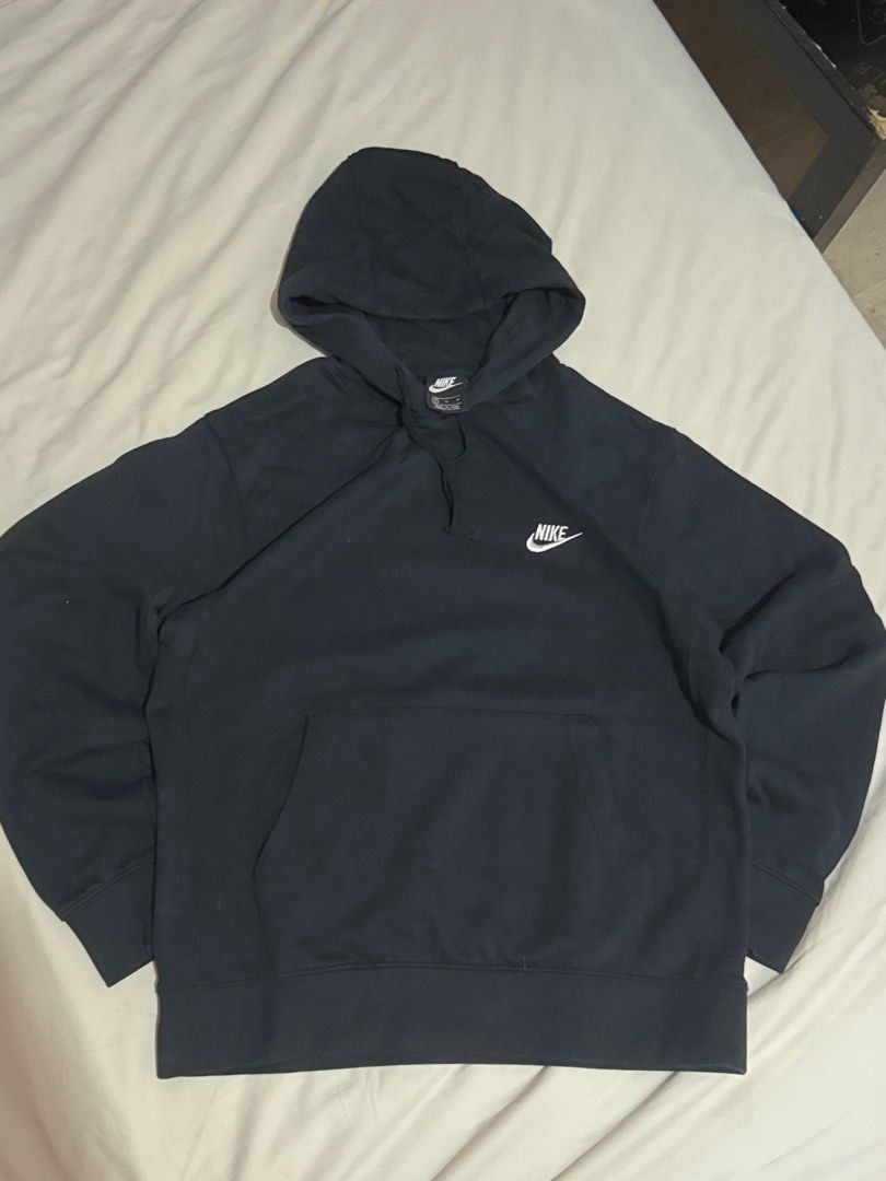 Nike Hoodie (Category: Hoodies) located in Manila. Submitted by acegood (Listing ID 1407521254, Image 1). Description: - Black Nike hoodie - With hood and front pocket - Nike logo on chest - Standard fit - Ribbed cuffs and hem - Perfect for everyday wear.