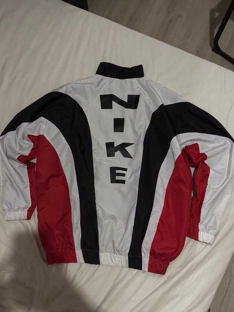 Nike tritone windbreaker (Category: Coats, Jackets and Outerwear) located in Manila. Submitted by acegood (Listing ID 1407517986, Image 2). Description: Dimes: 25x31.