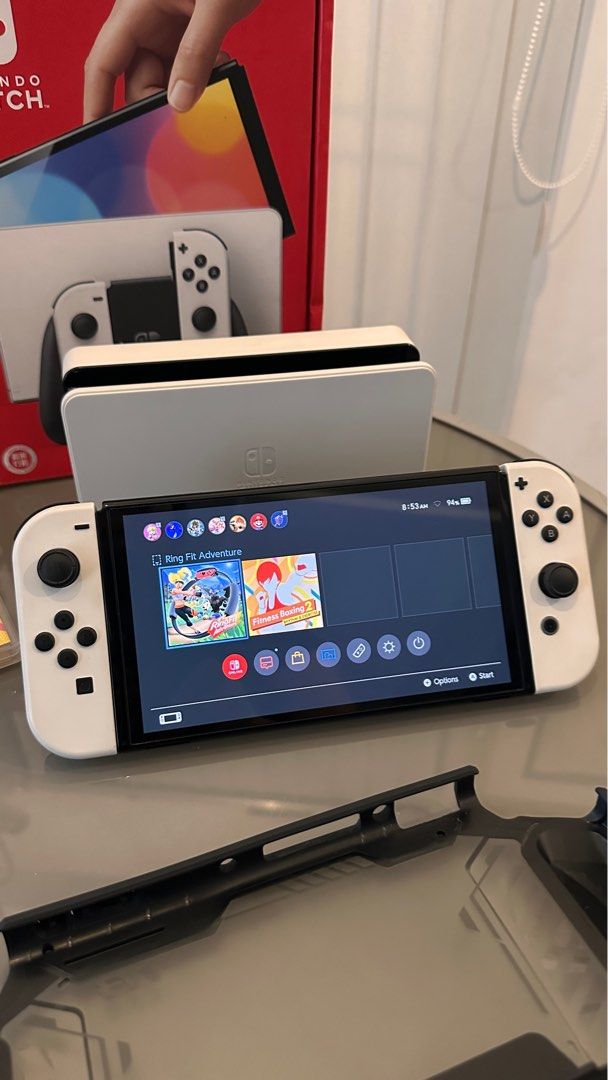 Nintendo Switch OLED (Category: Nintendo) located in Quezon City. Submitted by mythingsforless (Listing ID 1407512844, Image 2). Description: Selling my Nintendo Switch OLED (White) — looks brand new! Complete set and in excellent condition. So here’s the full bundle: -Switch OLED 64GB Complete set with box -RingFit set with box -Games: Ringfit Adventure & Fitness Boxing 2 -Dockable Rugged Protective case RFS: 1. Rarely used 2. Plano ko sana magi