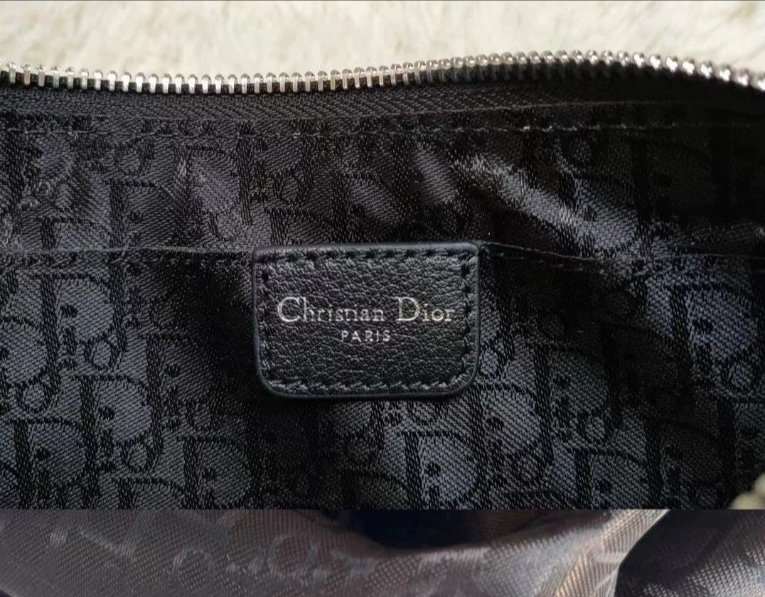 Rare Dior Spell Out Pochette Bag (Category: Luxury Bags & Wallets) located in Quezon City. Submitted by rarefindsgirlie (Listing ID 1407553811, Image 2). Description: (make sure to read the full description) ‼️note: 1st pic is for thumbnail/ref only - vintage christian dior -in good condition/with only signs of use -production date code 08-bo-1025, (december 2005) - measurements: approx 10 x 5 x 2 -extremely rare dior charm pochette in buttery so