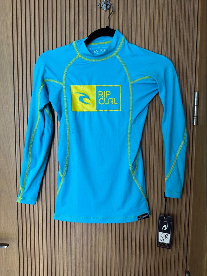 Ripcurl Light Blue Long Sleeves Rashguard (Category: Activewear) located in Makati City. Submitted by kytriestosell (Listing ID 1407438838, Image 1). Description: - brand new. Comes with tag.