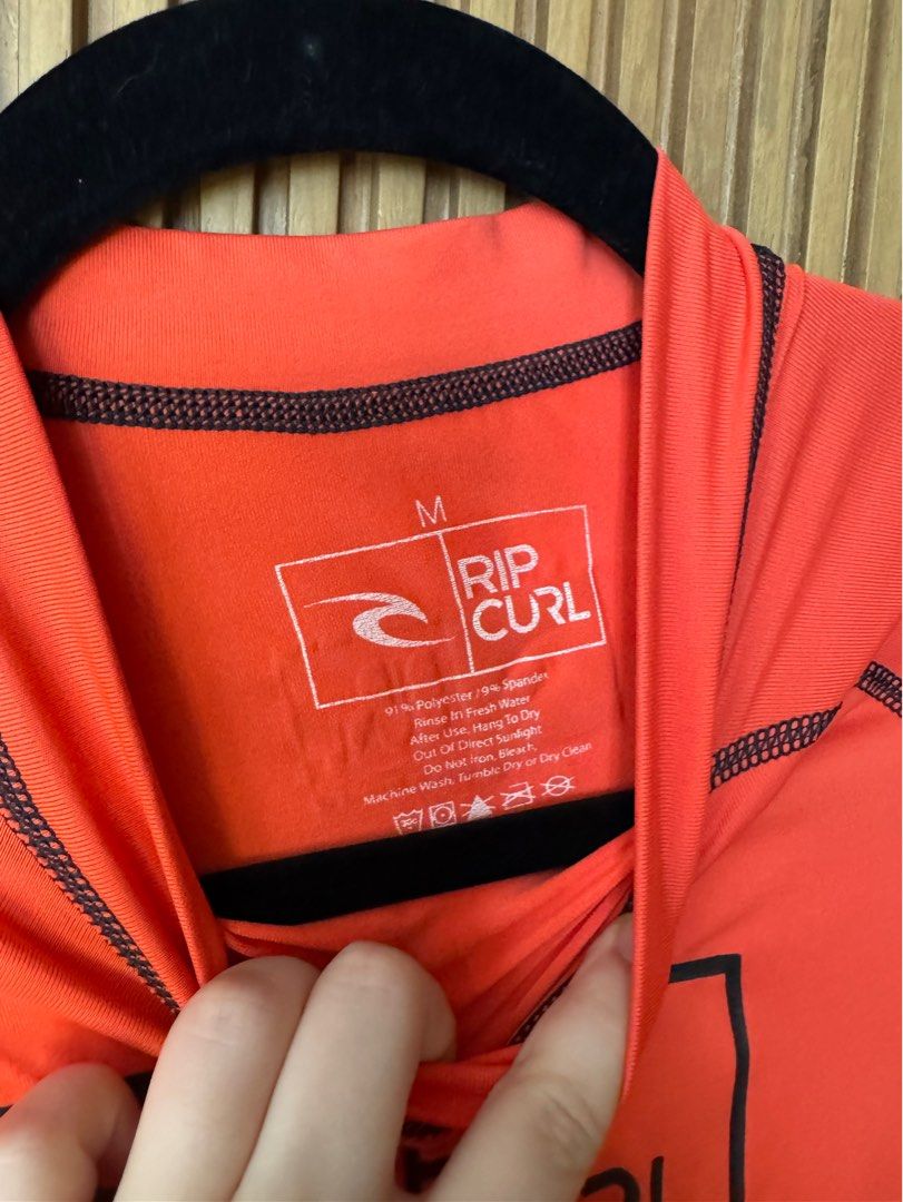 Ripcurl Orange Long Sleeves Rash Guard (Category: Activewear) located in Makati City. Submitted by kytriestosell (Listing ID 1407439615, Image 3). Description: - authentic ripcurl rash guard.
